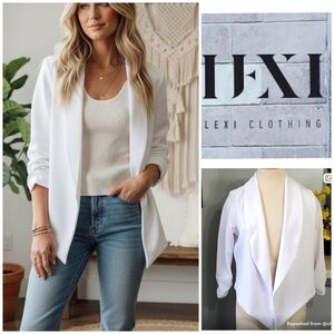 White polyester jacket. By Lexi. 3/4 sleeves,  open front. Size large.